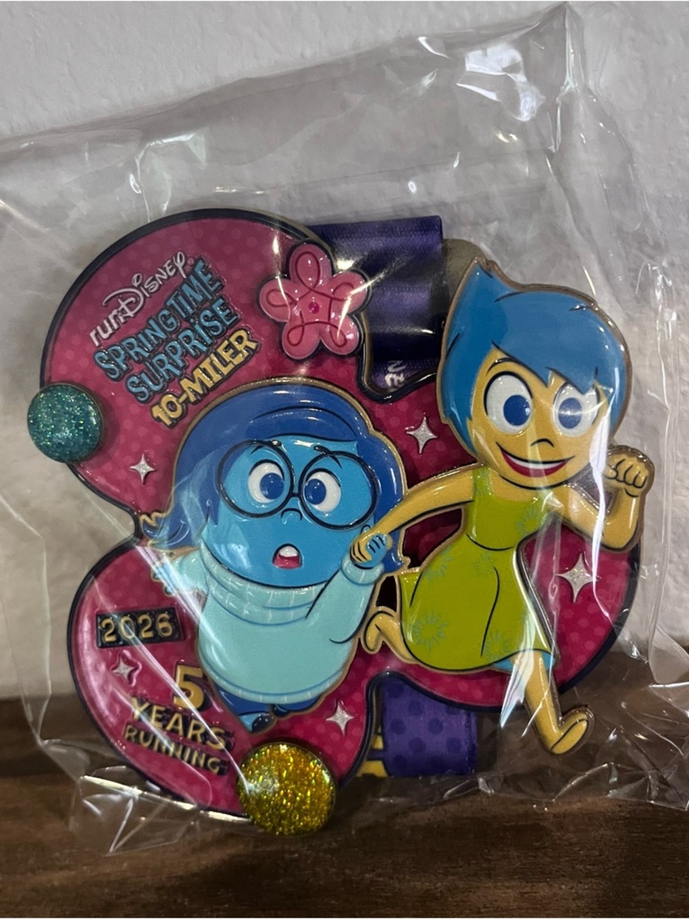 runDisney 2026 Springtime Surprise 10-miler Medal feat. Joy & Sadness, unopened